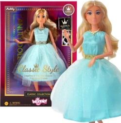 Woopie Royal lelle Lily 30 cm ar gariem blondiem matiem elegantās tirkīza kleitās