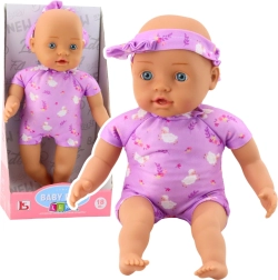 Auduma zīdaiņa lelle violetā bodijā ar bantīti, 31 cm