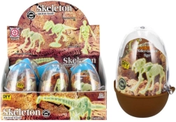 Spīdoša dinozaura skelets plastmasas olā – kolekcionējams salikšanas komplekts