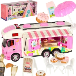 Pink remote-controlled camper van with accessories