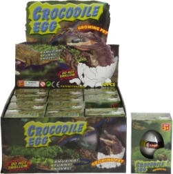 Ola ar augošu krokodilu ūdenī