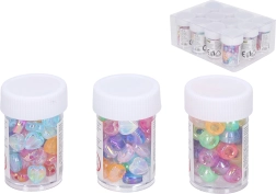 Colorful Plastic Beads in a Tube