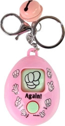 Rozā atslēgu piekariņš ar spēli akmens, papīrs, šķēres