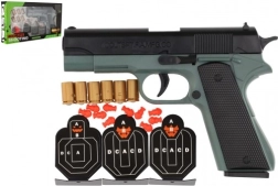 Pistole ar putuplasta lodiņiem ar mērķiem