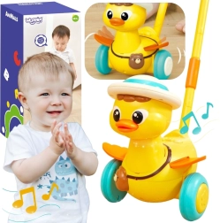 Woopie stumjamā poga‑staigulītis uz kāta pīlīte ar gaismām un skaņām