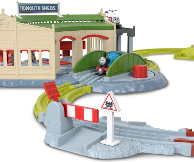 Interactive track features: barrier, bridge, and windmill