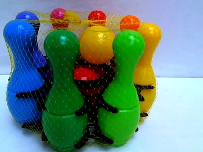 Mini bowling pins in a basket