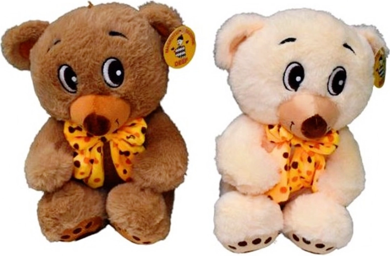Plush teddy bear with a polka-dot bow