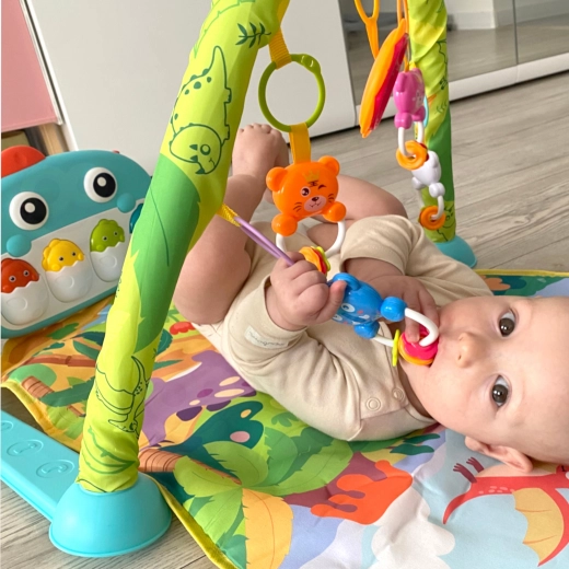 Arch with hanging toys for active play