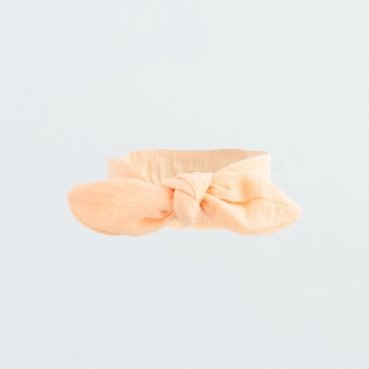 Muslīna zīdaiņu galvas lente New Baby Leny Peach (9–12 mēneši)