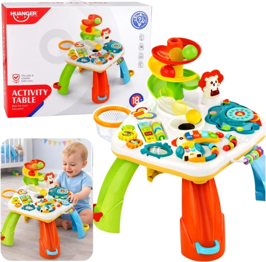 Interactive educational table with piano, ball slide, and light effects