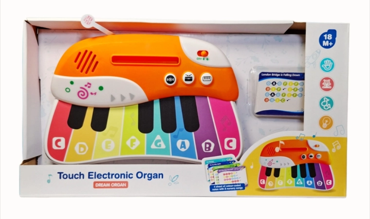 Children's electronic piano with play-along cards