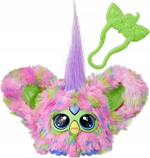 Mini Furby plaukstā ar klipsi ceļošanai