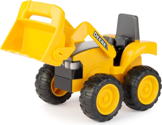Tractor/loader for scooping and moving material