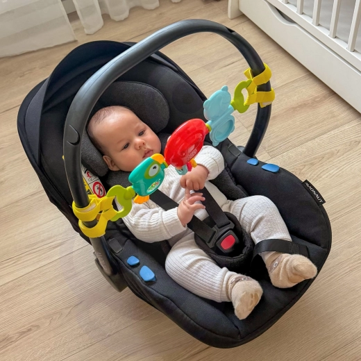 Easy attachment to a crib or stroller