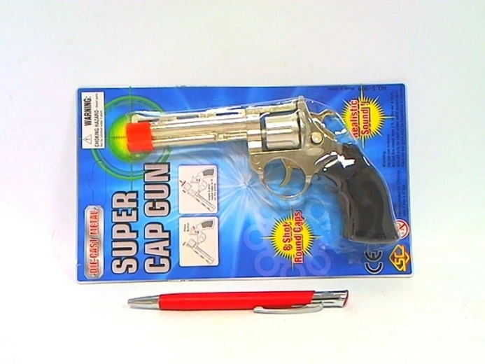 Metal cap gun in blister pack