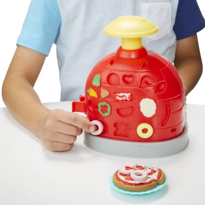 Izveidojiet picu jautrajā Play-Doh krāsnī