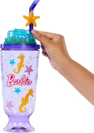 Cup with straw as a playful accessory