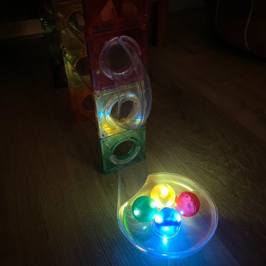 Illuminated marbles for unique play