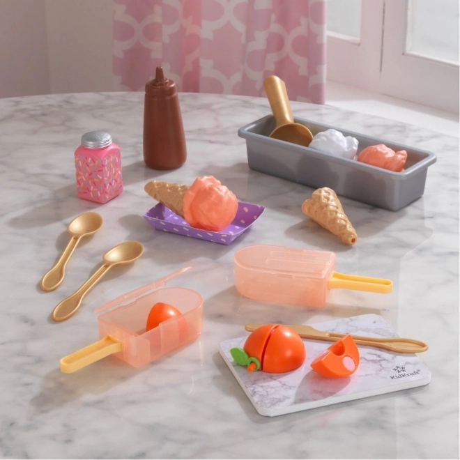 KidKraft Create & Cook persiku saldējumi uz kociņa – bērnu saldējuma komplekts (20 detaļas)