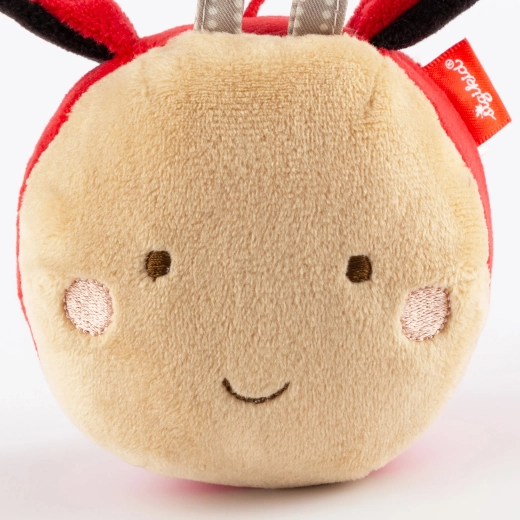 Soft plush, different textures, and an embroidered face