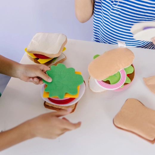 Layering, sorting, and developing fine motor skills