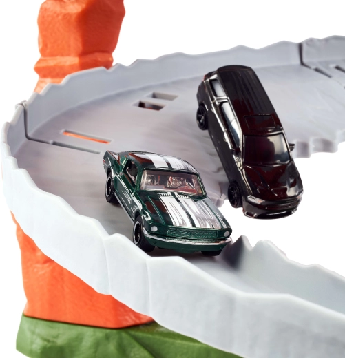 2 die-cast Matchbox cars in 1:64 scale included