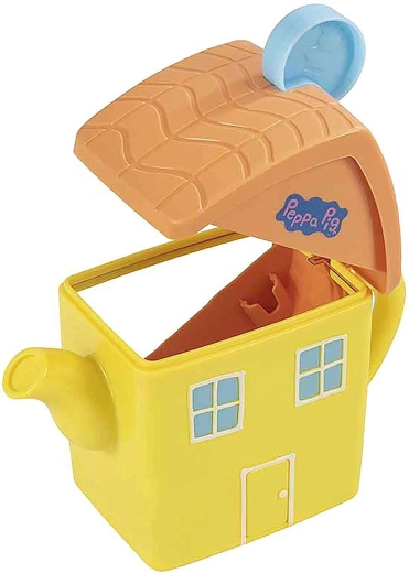 Singing house-shaped teapot