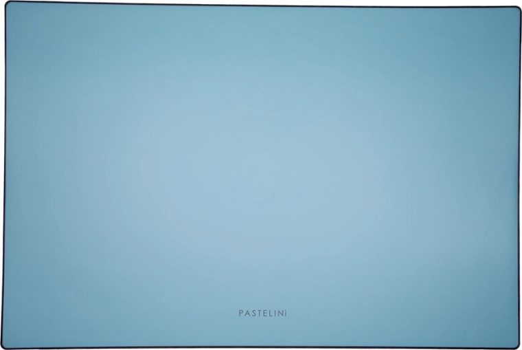 Pastelini zilais rakstāmgalda paliktnis