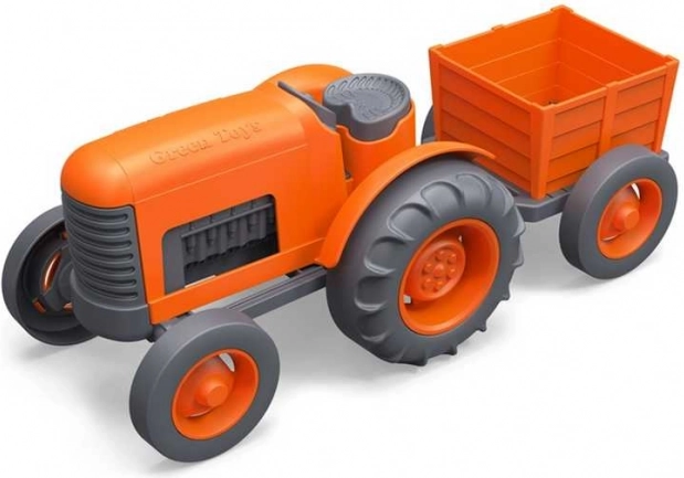 Oranžs traktors ar piekabi no Green Toys