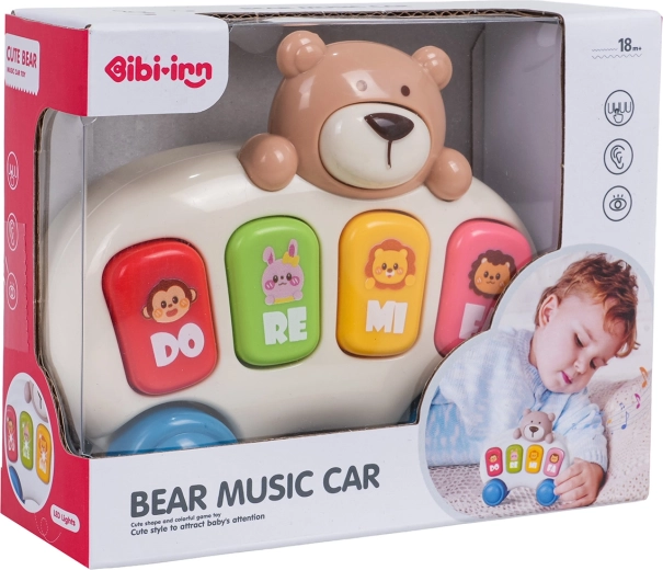 Musical mini piano with a teddy bear for little ones