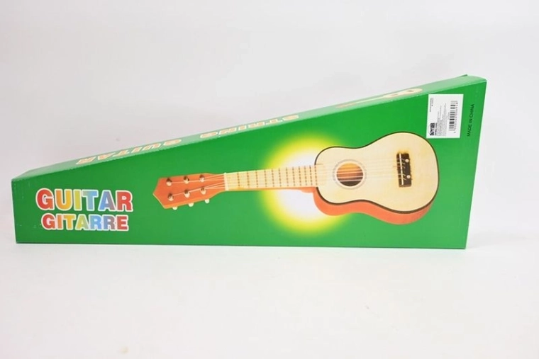 Children’s wooden guitar in a box