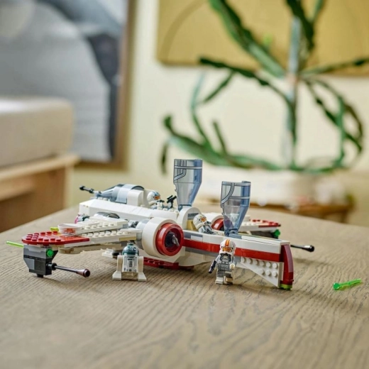 Three cockpits and a spot for the droid
