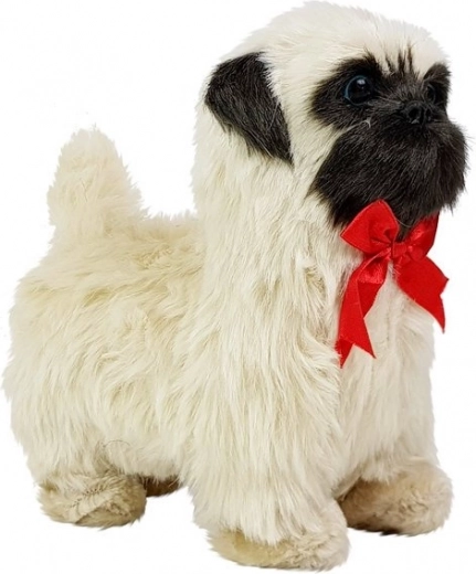 Reaģē uz pieskārienu: rej un kustinā asti