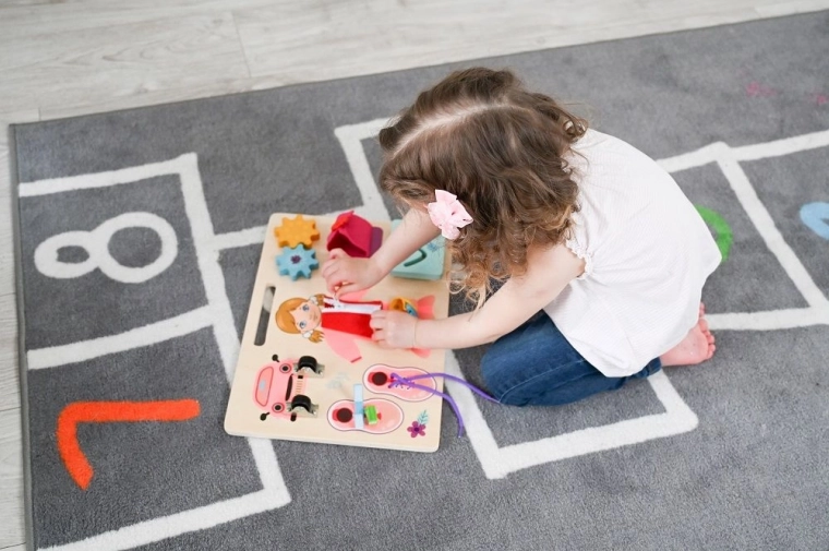 Develops fine motor skills