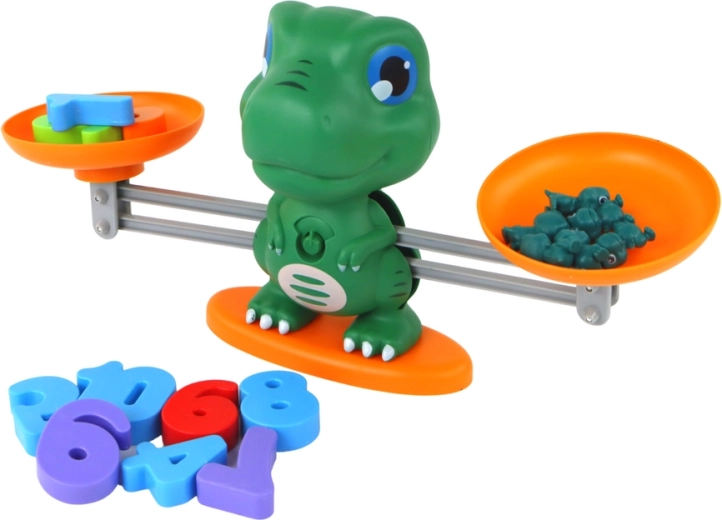 A balancing scale that teaches balance and numbers