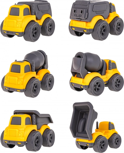 Trīs būvtransportlīdzekļi ar kustīgām detaļām